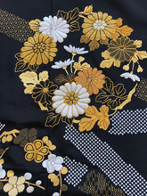 縫黒留袖「鬘帯に花の丸」